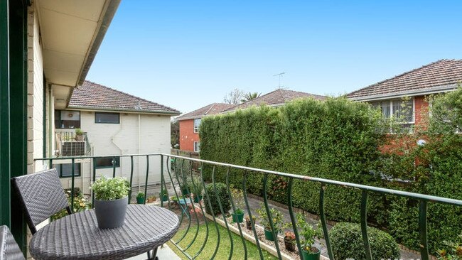 The north-facing balcony looks onto the shared garden space.