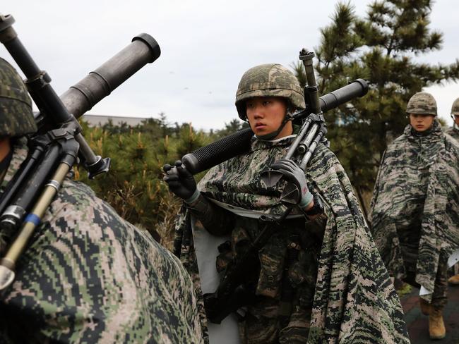 South Korean Marines take part in a military exercise on April 5 with their US counterparts. It is hoped the withdrawal of troops could lessen tensions on the Korean peninsula. Picture: Chung Sung-Jun/Getty Images