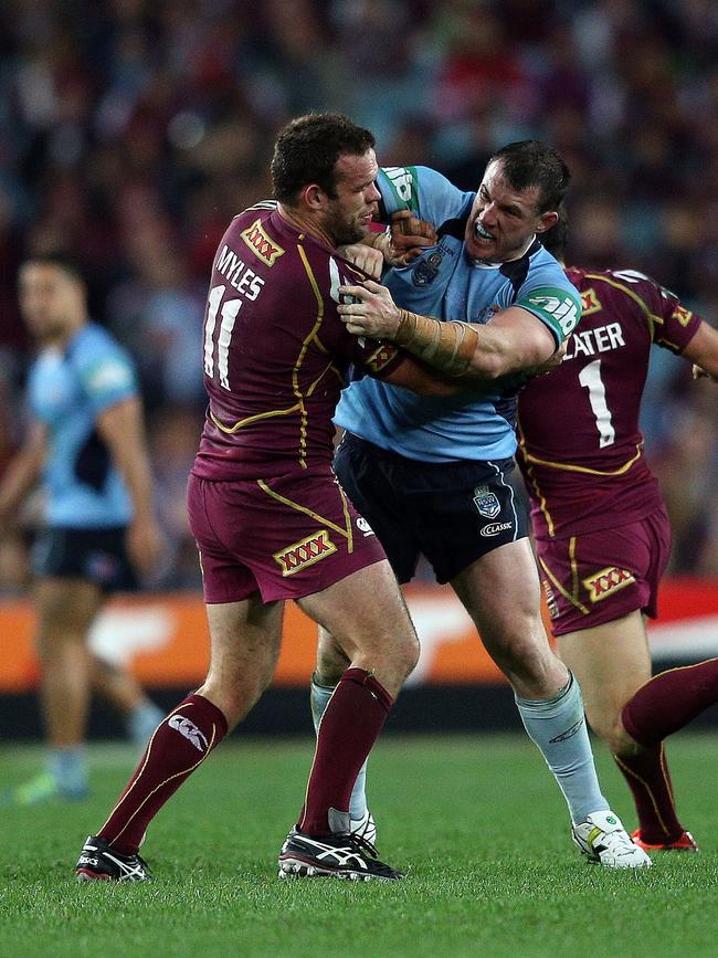 The punches that changed State of Origin - Paul Gallen (R) and Nate Myles fight during the opening match of the 2013 series.