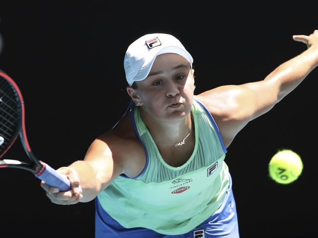 FILE - In this Jan. 28, 2020, file photo, Australia's Ash Barty makes a forehand return to Petra Kvitova of the Czech Republic during their quarterfinal match at the Australian Open tennis championship in Melbourne, Australia. Barty has joined the ranks of high-profile players expressing concern over the staging of the U.S. Open while thereÃ¢â¬â¢s still so much uncertainty in the coronavirus pandemic. The womenÃ¢â¬â¢s No. 1 hasnÃ¢â¬â¢t had the chance yet to defend her French Open title because all elite tennis competition is shuttered. SheÃ¢â¬â¢s already processed the fact thereÃ¢â¬â¢ll be no Wimbledon in 2020 but is still awaiting clarity on the U.S. Open, which is scheduled to begin Aug. 31, 2020. (AP Photo/Dita Alangkara, File)