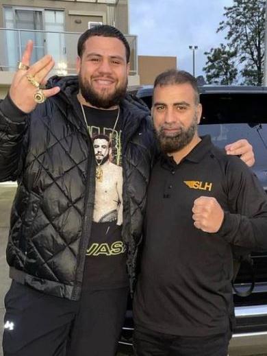 Sydney Luxury Hire employee Taha Sabbagh (right, with UFC star Tai Tuivasa) before his gangland assassination. Picture: Instagram.