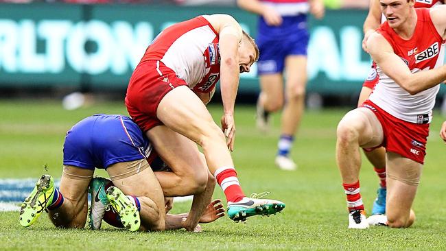 Easton Wood took out Dan Hannebery’s legs but no free kick was paid. Picture: Tim Carrafa