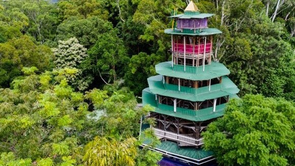 The temple soars seven storeys high above the tree canopy. Picture: Supplied.