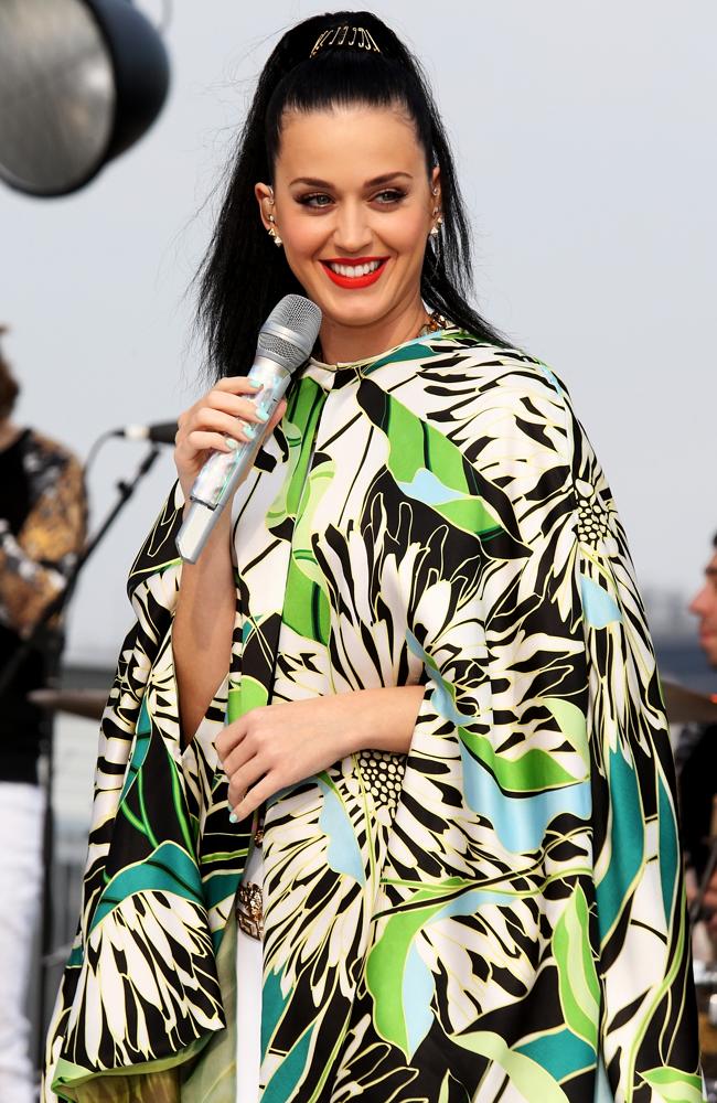 Katy Perry emerged in a colourful cape for her 