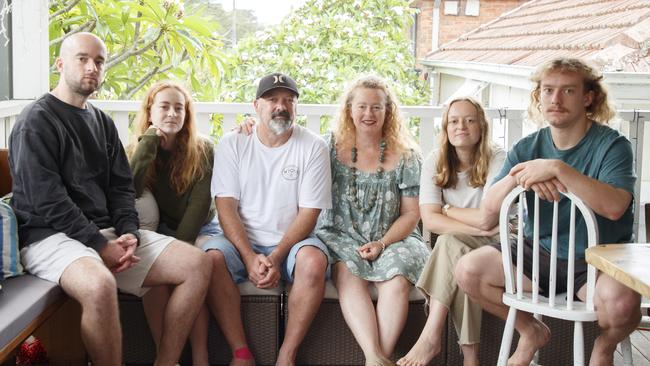 The Jones family, (from left) Sam, Maisy, dad Ross, mum Sarah, Molly and Toby, are still isolating until New Year’s Day on the northern beaches. Picture: Tim Pascoe