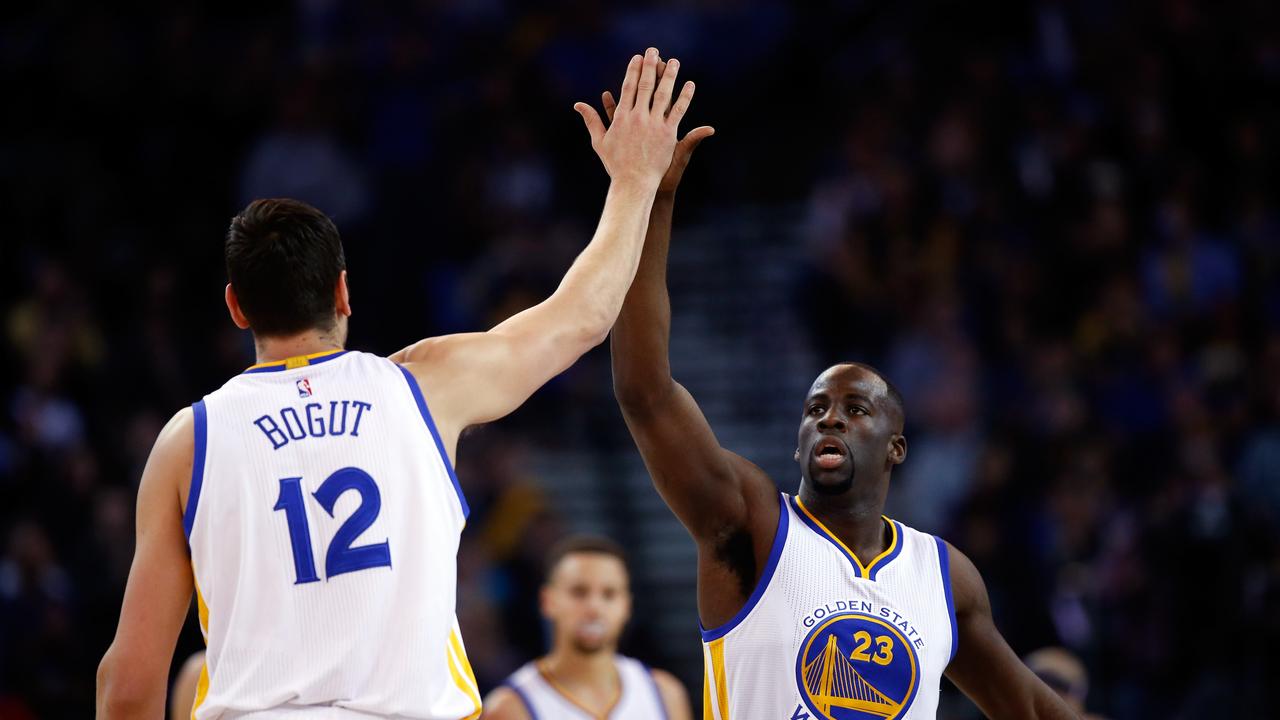 Andrew Bogut and Draymond Green playing together in 2016.