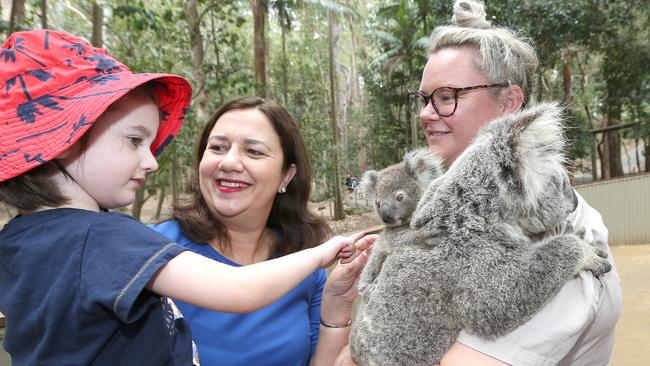 Premier Annastacia Palaszczuk with her niece Emma Tremble age 3 and koala specialist Sarah Eccleston get up close with some of our cutest koalas. Picture: Mike Batterham