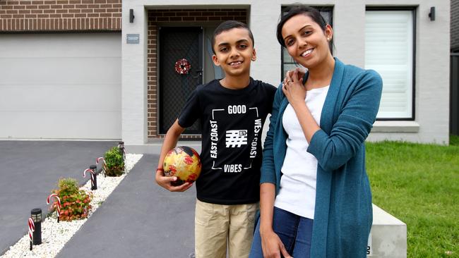 Vibhuti Shah and son Moksh live on Flynn Circuit and have been told they have a notification on their property. Picture: Toby Zerna