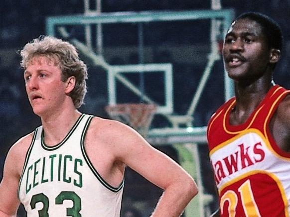 BOSTON - 1983: Dominique Wilkins #21 of the Atlanta Hawks and Larry Bird #33 of the Boston Celtics stand on the court during a game played in 1983 at the Boston Garden in Boston, Massachusetts. NOTE TO USER: User expressly acknowledges and agrees that, by downloading and or using this photograph, User is consenting to the terms and conditions of the Getty Images License Agreement. Mandatory Copyright Notice: Copyright 1983 NBAE (Photo by Dick Raphael/NBAE via Getty Images)