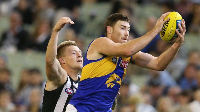 Jeremy McGovern outpoints Jordan De Goey during West Coast’s Round 3 win over Collingwood. Picture: Michael Klein.