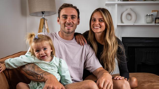 Port Adelaide star Jeremy Finlayson, his fiance Kellie Gardner and their daughter Sophia, 18 months, on February 2nd, 2023, at their Hendon home.Picture: Tom Huntley