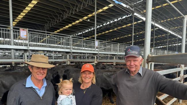 Pathfinder's Nick and Sara Moyle with granddaughter Sophia Moyle, 1, and bull client and vendor Kevin Wyatt, Mt Richmond at the Mortlake sale.