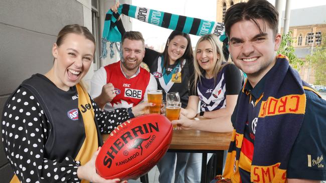 Holly Payne (Richmond), Kym Bond, (Sydney), Lauren Bond,(Freemantle), Georgie Orchard, (Port Adelaide) and Jack Trim, (Crows). Picture: Dean Martin