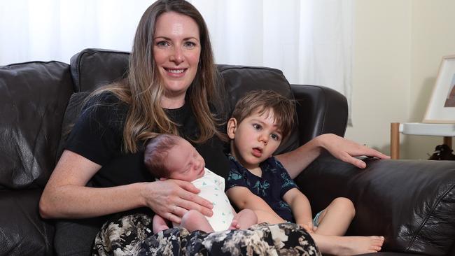 Sarah-Ann Taylor and her son Franklin who suffers from cerebral palsy and new baby Roman at their home in Jannali. Picture: Brett Costello