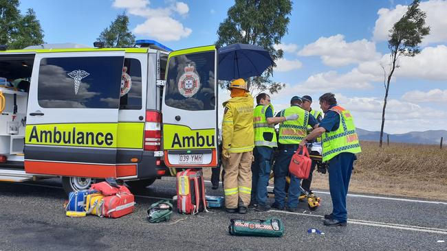 Paramedics work to stabilise the man before he is airlifted to the Royal Brisbane and Women’s Hospital in a critical condition. Photo: Frances Klein