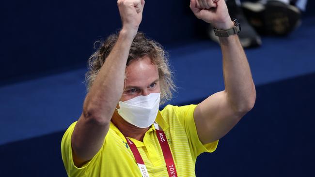 Dean Boxall of Team Australia reacts in a slightly more calm way than usual to Ariarne Titmus' gold medal win in the Women's 200m Freestyle. (Photo by Laurence Griffiths/Getty Images)