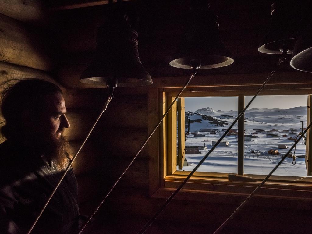“An Antarctic Advantage” by photographer Daniel Berehulak for The New York Times which won first prize Daily Life stories shows a priest looking on in the Bell room, after a vigil at the Russian Orthodox Church of the Holy Trinity, Fildes Bay, Antartica, Dec. 3, 2015.(Daniel Berehulak/The New York Times, World Press Photo via AP)