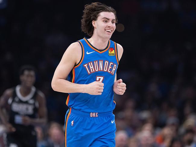 OKLAHOMA CITY, OKLAHOMA - APRIL 10: Josh Giddey #3 of the Oklahoma City Thunder smiles as he runs up court during the first half against the San Antonio Spurs at Paycom Center on April 10, 2024 in Oklahoma City, Oklahoma. NOTE TO USER: User expressly acknowledges and agrees that, by downloading and or using this Photograph, user is consenting to the terms and conditions of the Getty Images License Agreement. (Photo by Joshua Gateley/Getty Images)