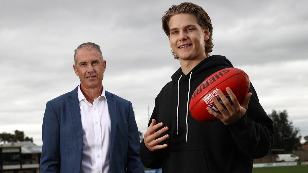 Father-son prospect Will Ashcroft, with his father Marcus, a three-time Brisbane premiership player. Picture: Michael Klein