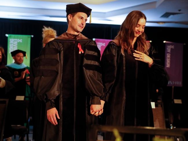 Back in May Snapchat co-founder Evan Spiegel received an honorary Doctorate, as did his wife Miranda Kerr, from his old summer school - the Otis College of Art and Design.