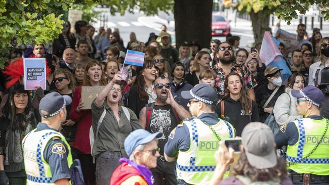 Anti-trans activists outside the Tasmanian Parliament as Equality Tasmania and LGBTQI+ supporters counter protested the Let Women Speak rally in March. Picture: Chris Kidd