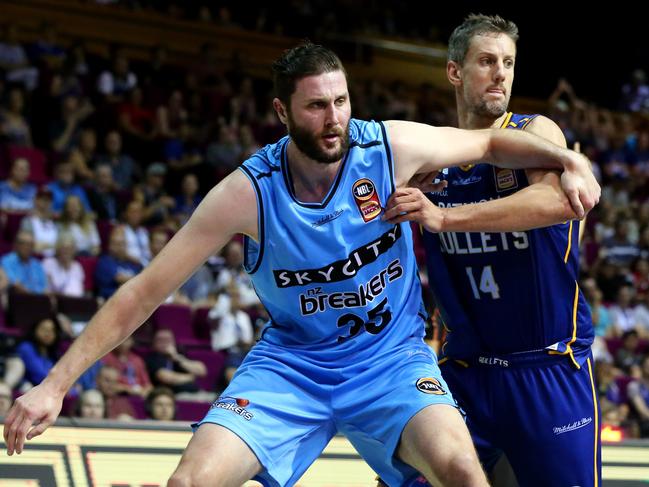 Alex Pledger goes at it with fellow big man Daniel Kickert. Picture: AAP