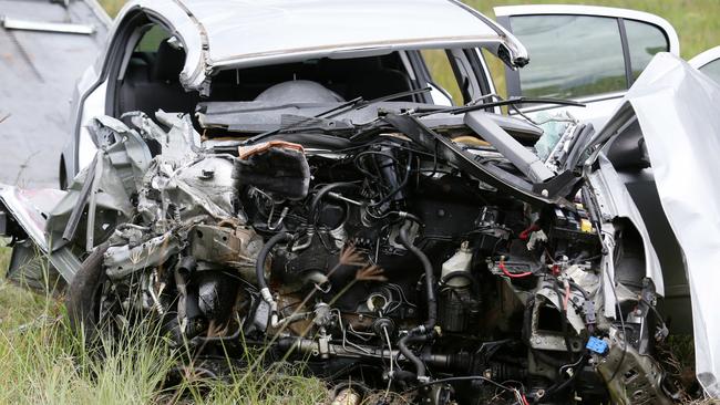 Mangled wreck. The 49-year-old driver is seriously injured and being treated at Liverpool Hospital. Picture: Ian Svegovic