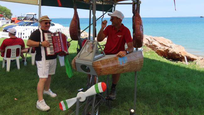 Frank 'Mr Accordion Man' Miranda entertains alongside Max at the 2025 Darwin Italian Festival. Picture: Aden Hill