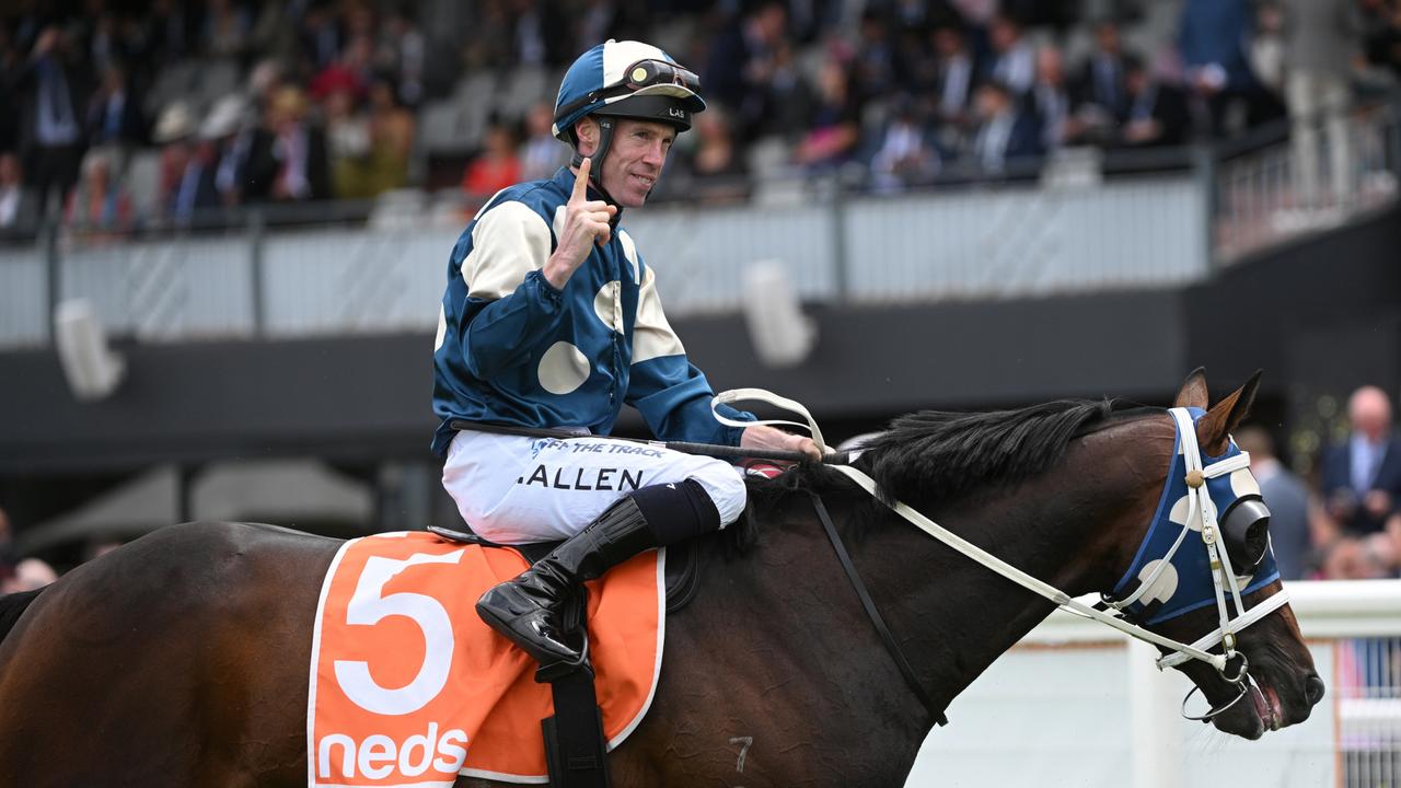 MELBOURNE, AUSTRALIA - OCTOBER 21: John Allen riding Sunsets after winning Race 2, the Neds Classic, during Melbourne Racing at Caulfield Racecourse on October 21, 2023 in Melbourne, Australia. (Photo by Vince Caligiuri/Getty Images)