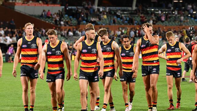 Crows players leave Adelaide Oval after losing to Geelong on Thursday night. Picture: Mark Brake/Getty Images