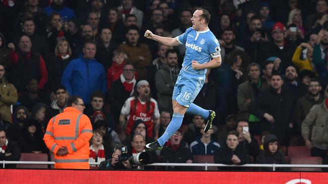 Stoke City's Scottish midfielder Charlie Adam celebrates after scoring.