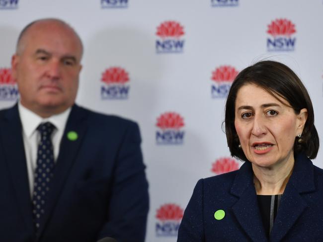 Premier Gladys Berejiklian (right) and Police and Emergency Services Minister David Elliott speak to the media. Picture: Dean Lewins/AAP