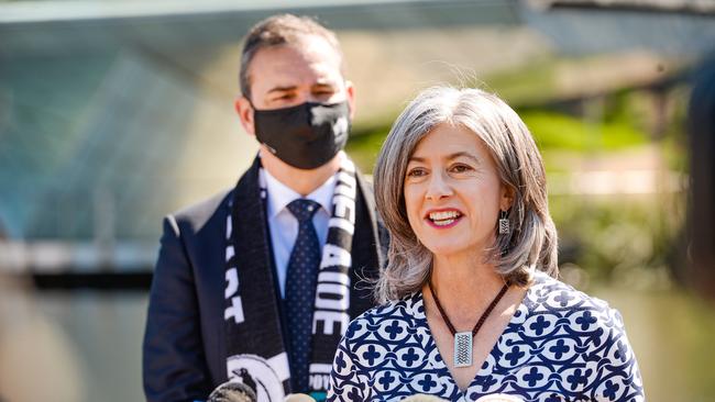 Premier Steven Marshall, wearing his Port Adelaide scarf and chief public health officer Professor Nicola Spurrier at the August announcement of the 2021 National Pharmacies Christmas Pageant. Picture: NCA NewsWire / Brenton Edwards