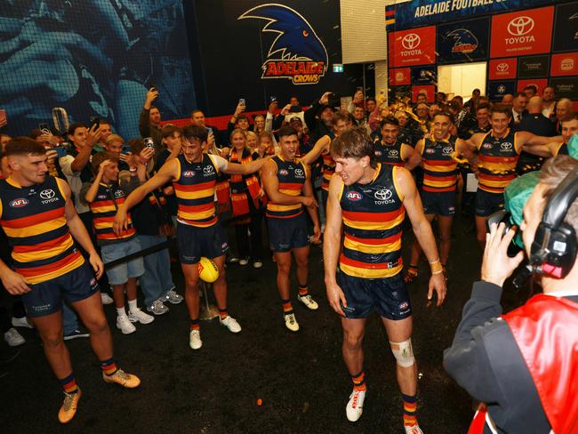 ADELAIDE, AUSTRALIA - MAY 02: Daniel Curtin of the Crows gets a Gatorade shower during the 2024 AFL Round 08 match between the Adelaide Crows and the Port Adelaide Power at Adelaide Oval on May 02, 2024 in Adelaide, Australia. (Photo by James Elsby/AFL Photos via Getty Images)