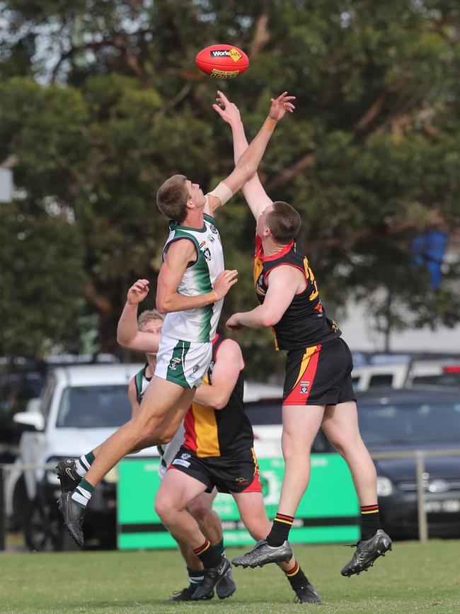 Bell Park's Ned Payne and St Joseph's Liam Betson go up. St Joseph's v Bell Park GFNL Football. Picture: Alan Barber