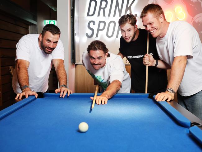James Tedesco, Connor Watson, Lindsay Collins and Sam Walker at the reopening of The Sporting Globe bar. Picture: Rohan Kelly