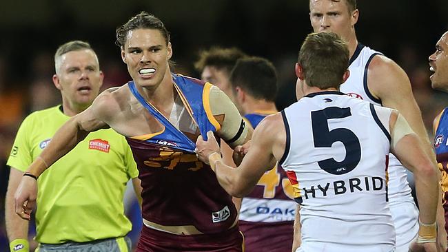 Eric Hipwood gets hot under the collar with Matt Crouch while Alex Keath watches on. Picture: AAP Image/Jono Searle