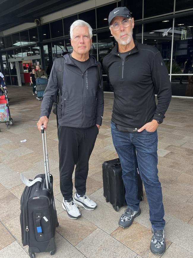 LAX passengers Barry Epperson (left) and John Fowler who know people who lost their homes in the LA fires. Picture: Emily Kowal