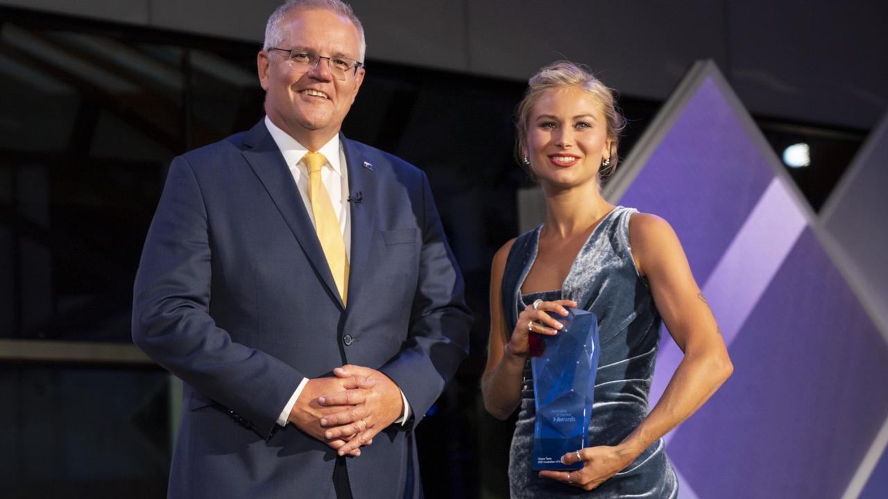 Prime Minister Scott Morrison with Australian of the Year Award winner Grace Tame. Picture: NCA NewsWire/Martin Ollman