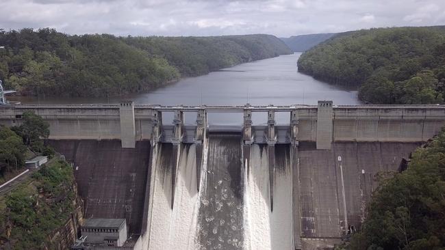 Warragamba Dam spilling flood waters over its wall in March 2022.