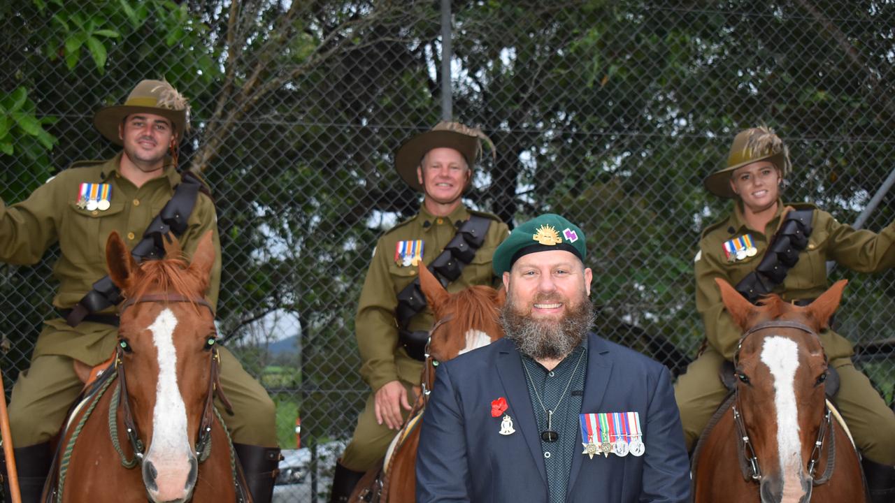 Jarryd Townson standing in front of Ben Burston, John McGill and Ben Burston at the Kuttabul dawn service at the Hampden State School Remembrance Garden 2021. Picture: Lillian Watkins