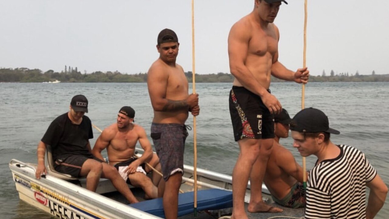 Mitchell, Elliott and James Roberts try their hand at spear fishing.