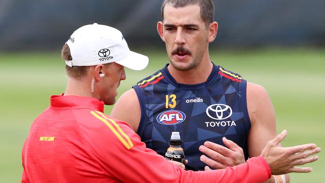 Friday, 18th February, 2022 – Crows Training at West Lakes. Taylor Walker talks to Nathan von Berlo during training Picture: Sarah Reed