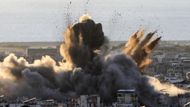 A cloud of smoke erupts following an Israeli airstrike on Beirut's southern suburbs on October 19, 2024. Picture: AFP