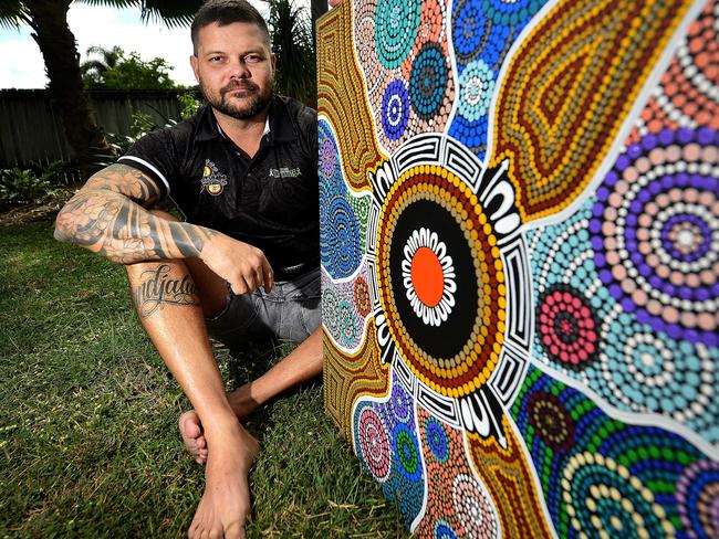 Local artist Chris Gray has donated a piece of his indigenous artwork to the Townsville University Hospital's childrens ward after picking up the hobby following a 15 year break. PICTURE: MATT TAYLOR.