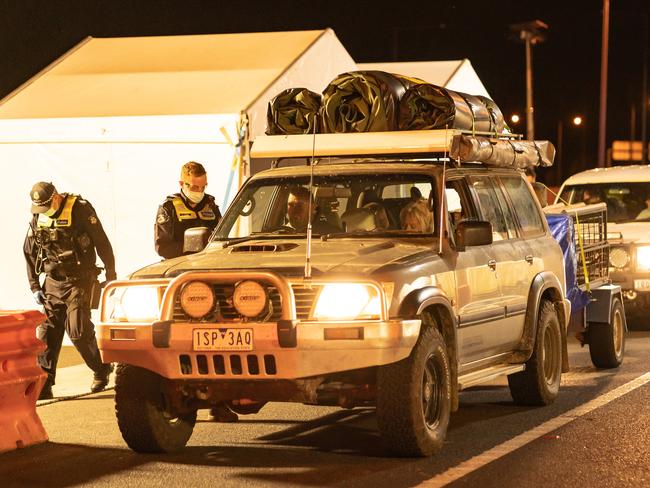 Wodonga Victoria, AUSTRALIA - Herald Sun - 2nd January, 2020:Hume Freeway check point on the Victorian side of the border near Wodonga after midnight when the border closed to people traveling from NSW to Victoria.This family was turned around.BYLINE -  Simon Dallinger