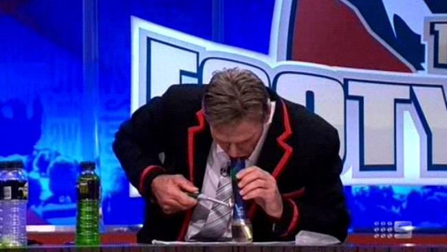 Newman appears to smoke a bong on The Footy Show in 2012.