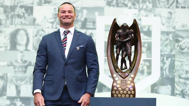 Sydney Roosters captain Boyd Cordner poses with the Provan-Summons Trophy. Picture: Getty Images