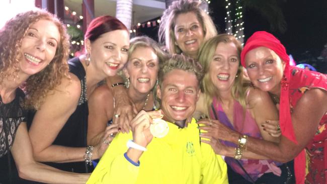 Commonwealth games triathlon gold medalist Mathew Hauser poses with fans at the Star Casino on the Gold Coast.