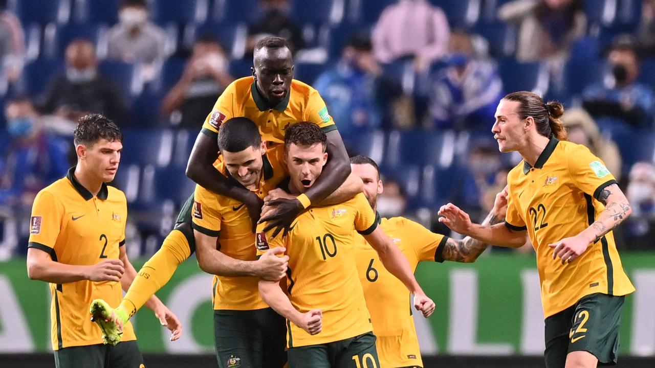 Australia's midfielder Ajdin Hrustic (C) celebrates after scoring a goal against Japan at Saitama Stadium in Saitama. Photo: AFP